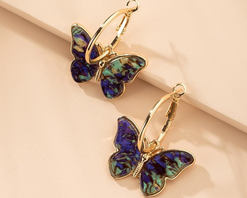 Earrings with multicolored butterflies in gold