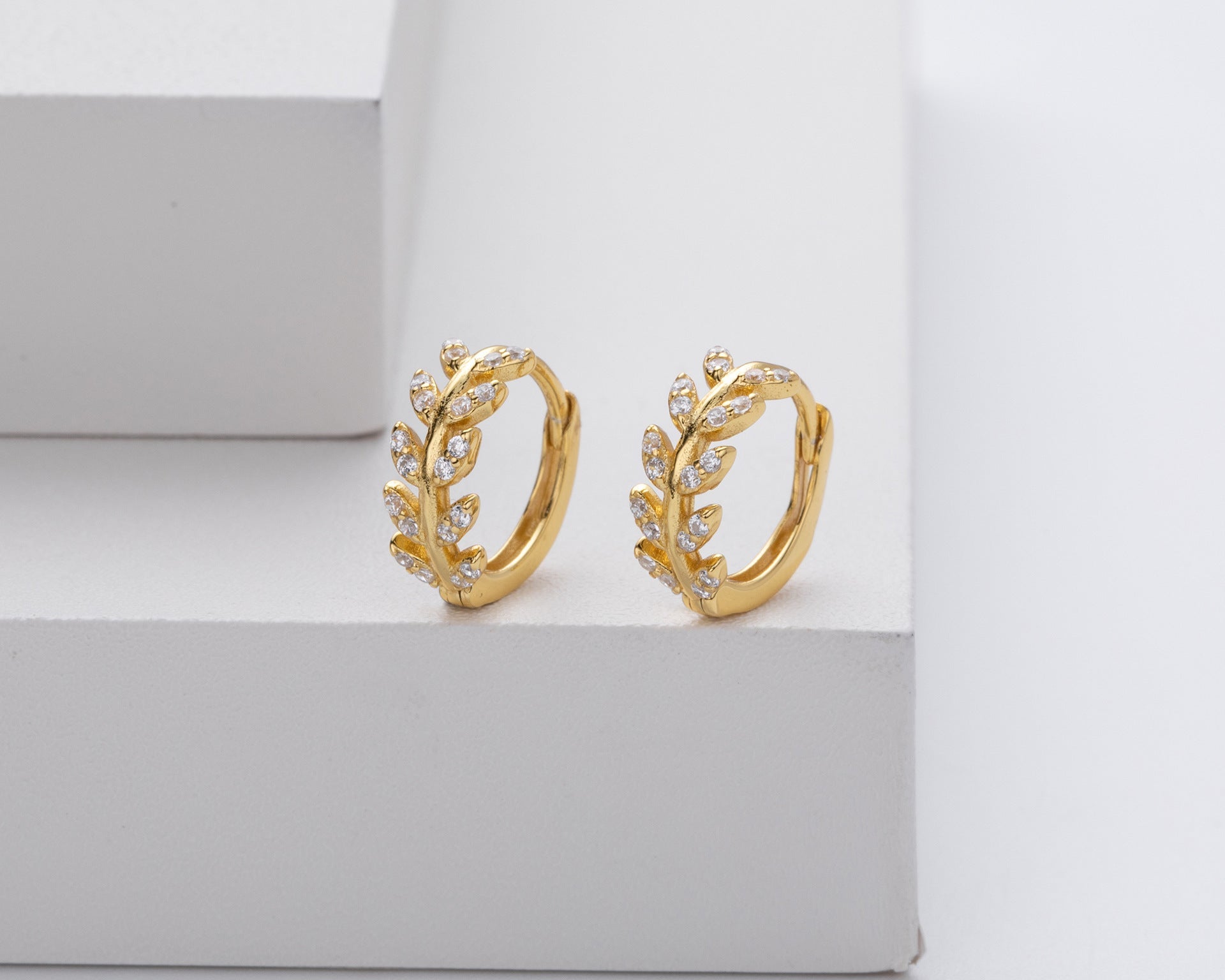 Leafy silver hoops