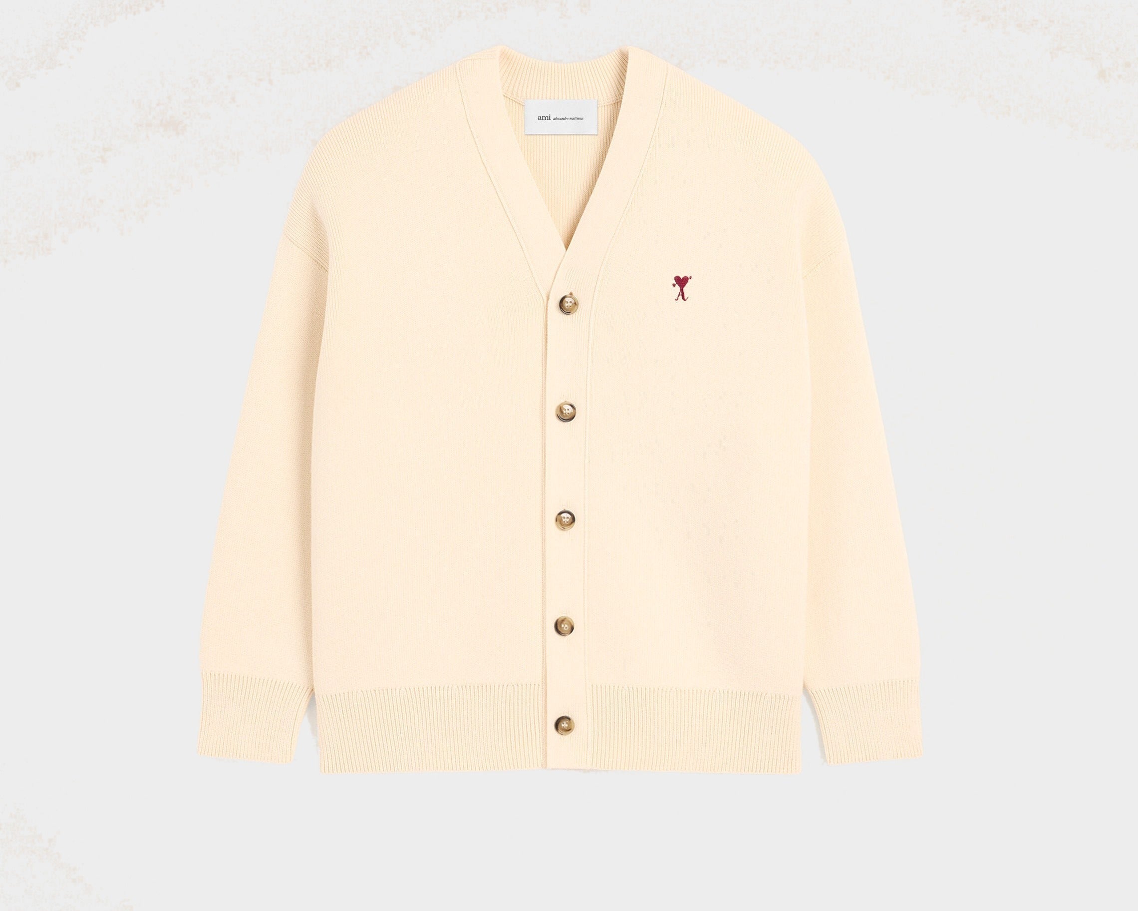 Cardigan blanc en coton et laine Ami de Coeur flèche