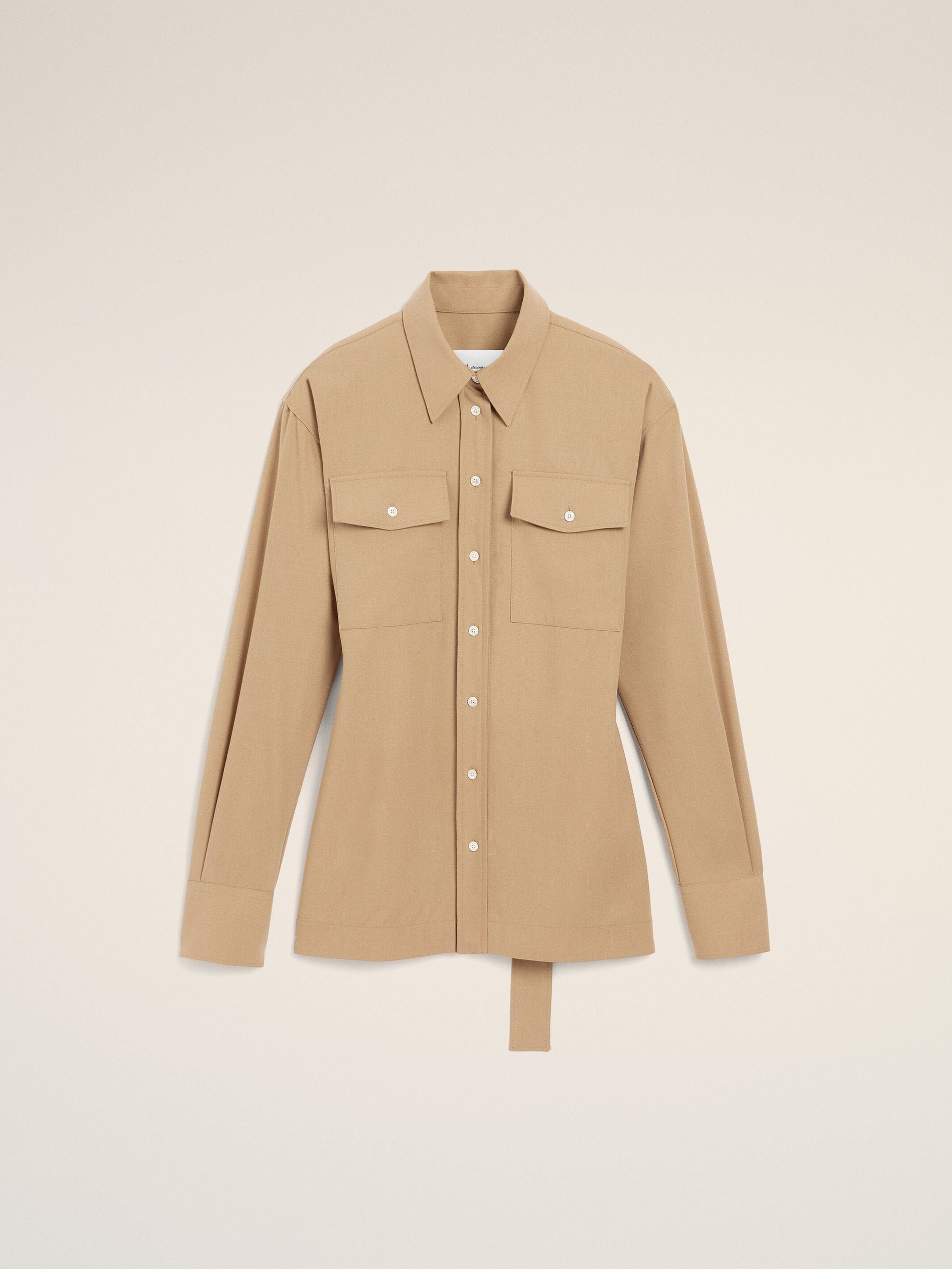 Chemise beige cintrée en laine manches ballon