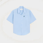 Chemise boxy bleue en coton manches courtes Ami de Coeur tulipe