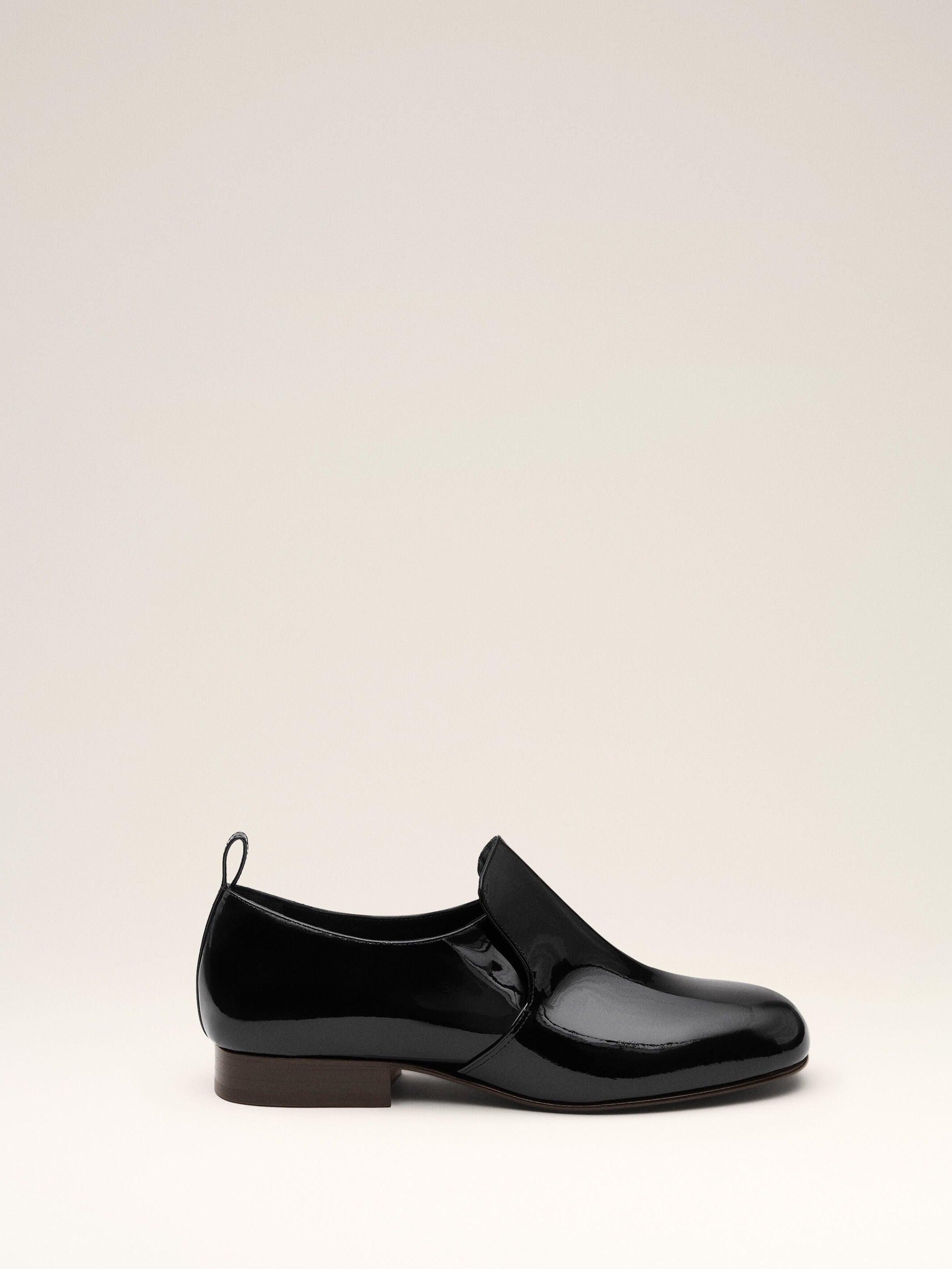 Souliers plats noirs en cuir de veau